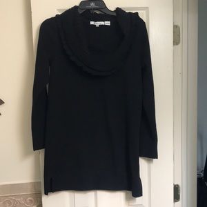 Black cowl neck sweater.